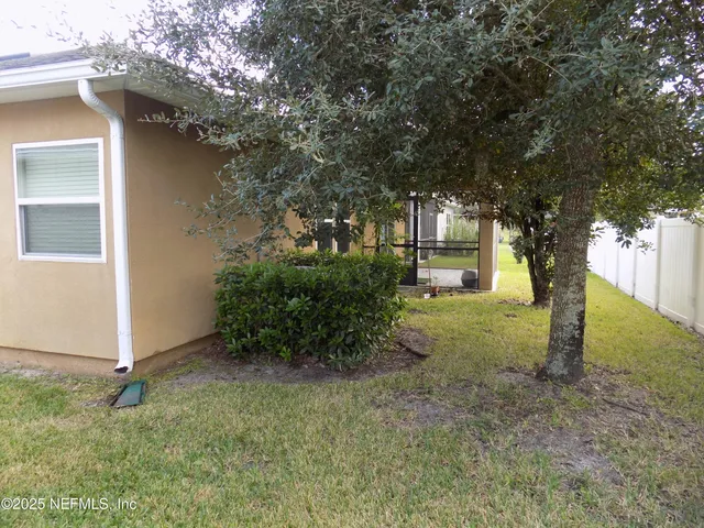 front view of a house with a garden