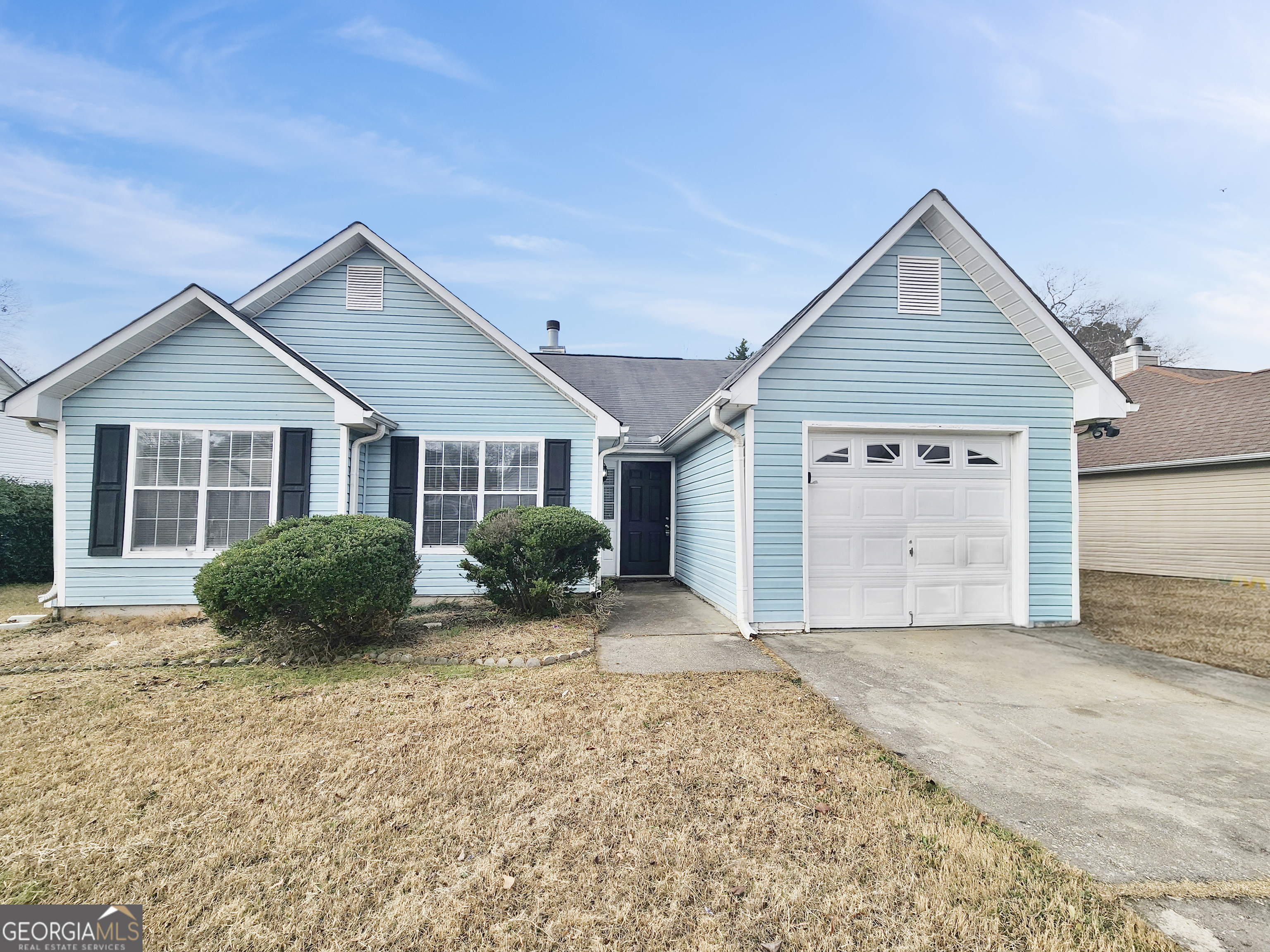 5855 Creekside Drive Rex, GA 30273 - Photo 2 of 18 a view of a house with a yard and fence