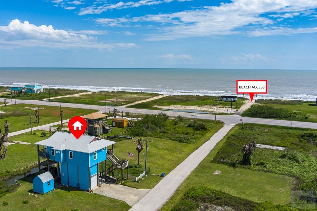 1024 Mae Street Port Bolivar, TX 77650 - Photo 2 of 27 a view of a swimming pool with an outdoor seating