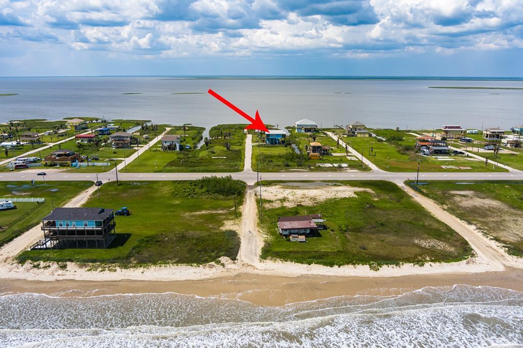 1024 Mae Street Port Bolivar, TX 77650 - Photo 25 of 27 a view of swimming pool with a garden and plants