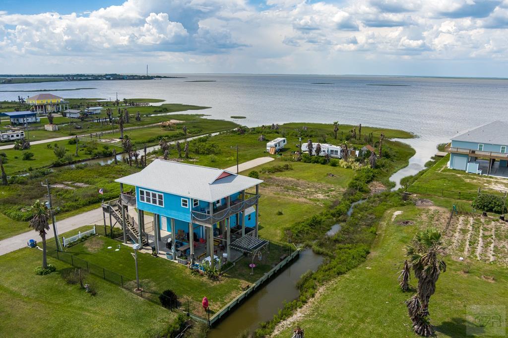 1024 Mae Street Port Bolivar, TX 77650 - Photo 3 of 27 an aerial view of residential houses with outdoor space