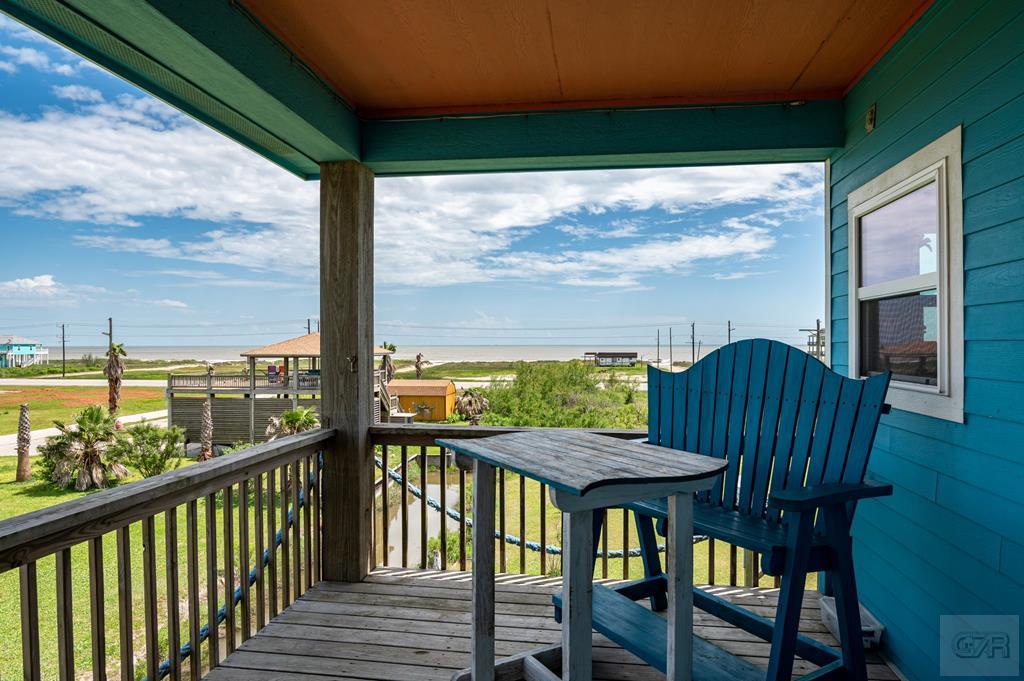 1024 Mae Street Port Bolivar, TX 77650 - Photo 7 of 27 a view of a city from a dining room with furniture and window