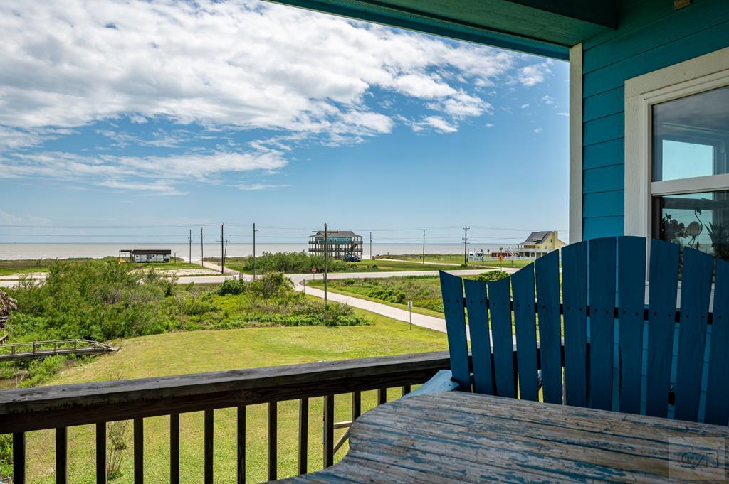 1024 Mae Street Port Bolivar, TX 77650 - Photo 8 of 27 a view of a balcony with wooden floor