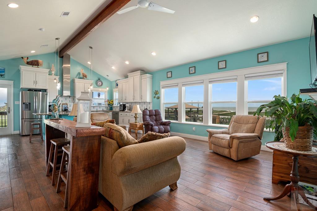 1024 Mae Street Port Bolivar, TX 77650 - Photo 9 of 27 a living room with furniture and a large window