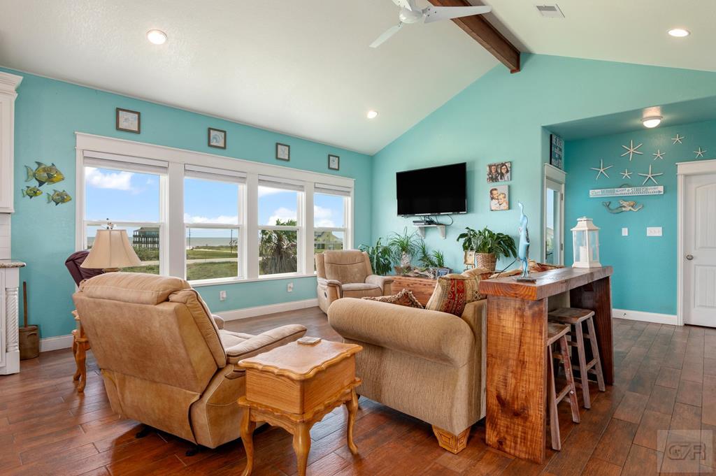 1024 Mae Street Port Bolivar, TX 77650 - Photo 10 of 27 a living room with furniture and a flat screen tv