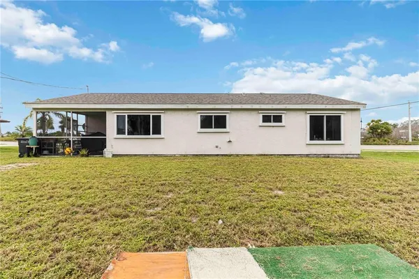 a front view of a house with yard