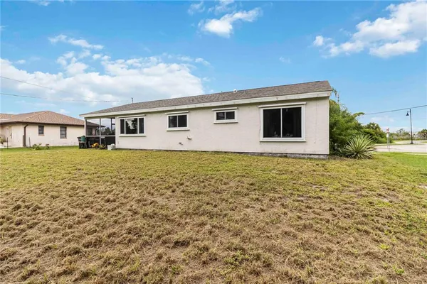 a house view with a garden space