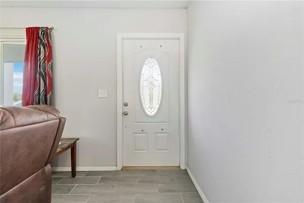 a view of a livingroom with furniture and wooden floor
