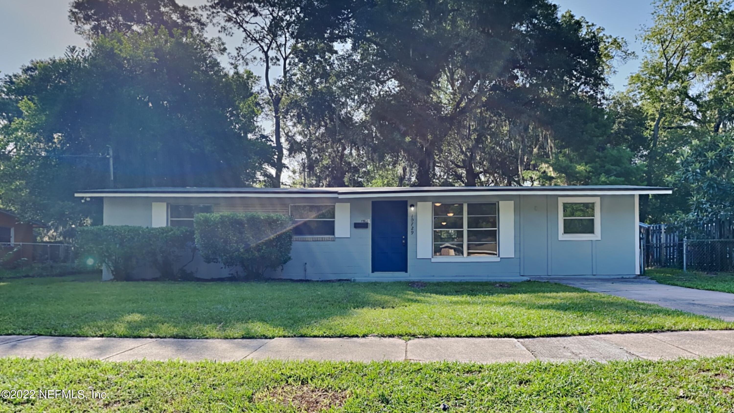 10729 Tulsa Road Jacksonville, FL 32218 - Photo 1 of 21 a view of house with a yard