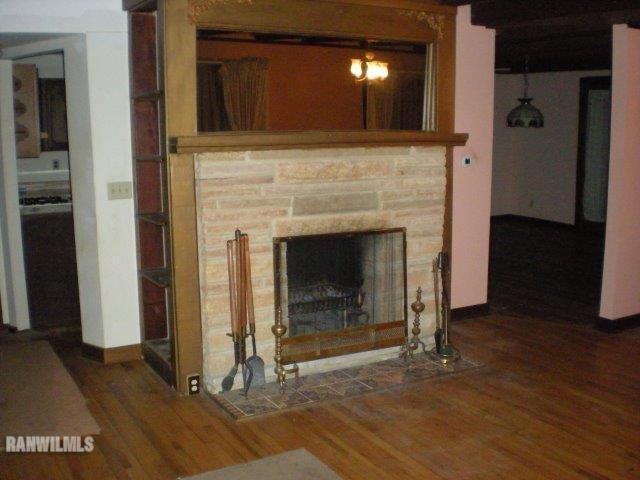 23929 Carroll Road Lanark, IL 61046 - Photo 4 of 25 a living room with a fireplace