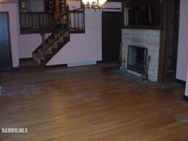 23929 Carroll Road Lanark, IL 61046 - Photo 6 of 25 a living room with furniture and a fireplace