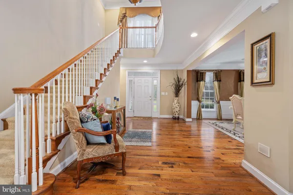 a view of a kitchen and an empty room