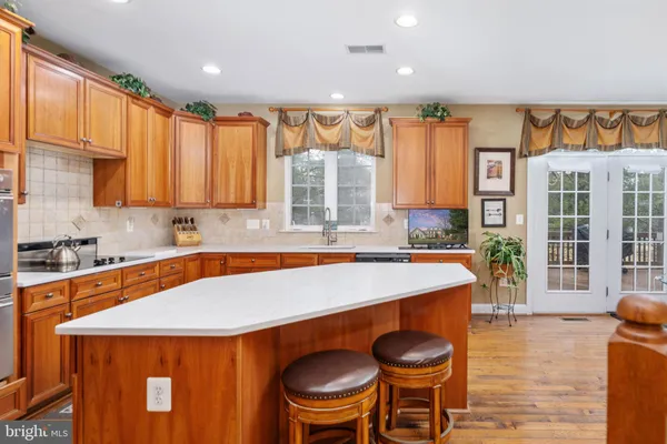 a kitchen with granite countertop lots of counter top space