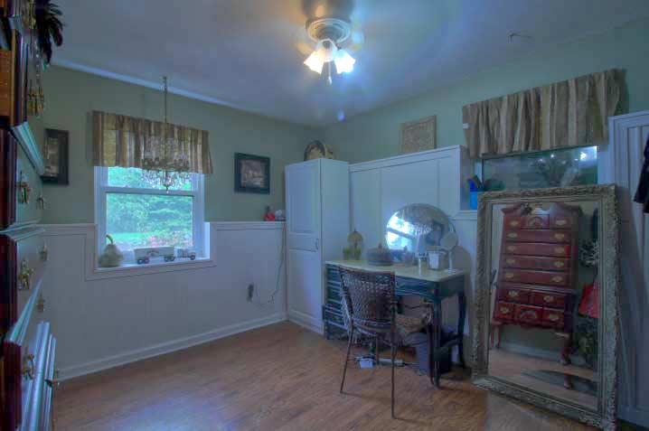 3661 Alleghany Spring Road Shawsville, VA 24162 - Photo 22 of 26 a room with furniture and a fireplace