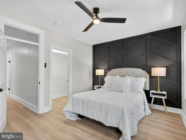 a bedroom with a bed and a closet