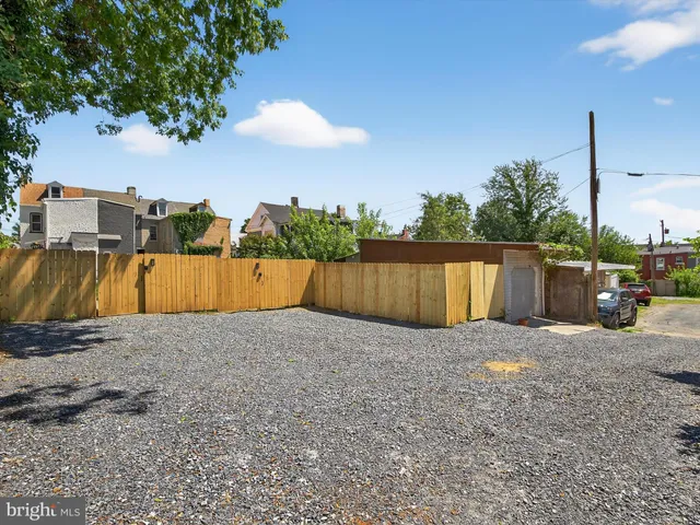 a view of a backyard of a house