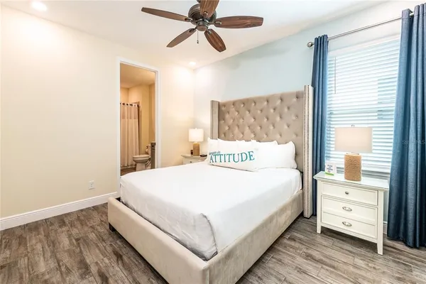 a bedroom with a bed and closet