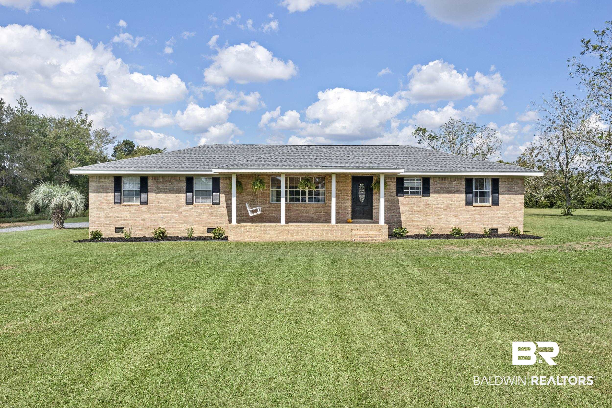 17689 Brewer Road Foley, AL 36535 - Photo 13 of 54 Ranch-style house featuring a front lawn