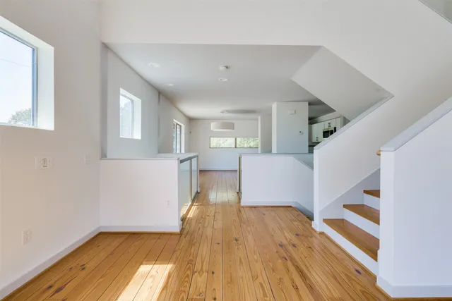 a view of a kitchen from the hallway