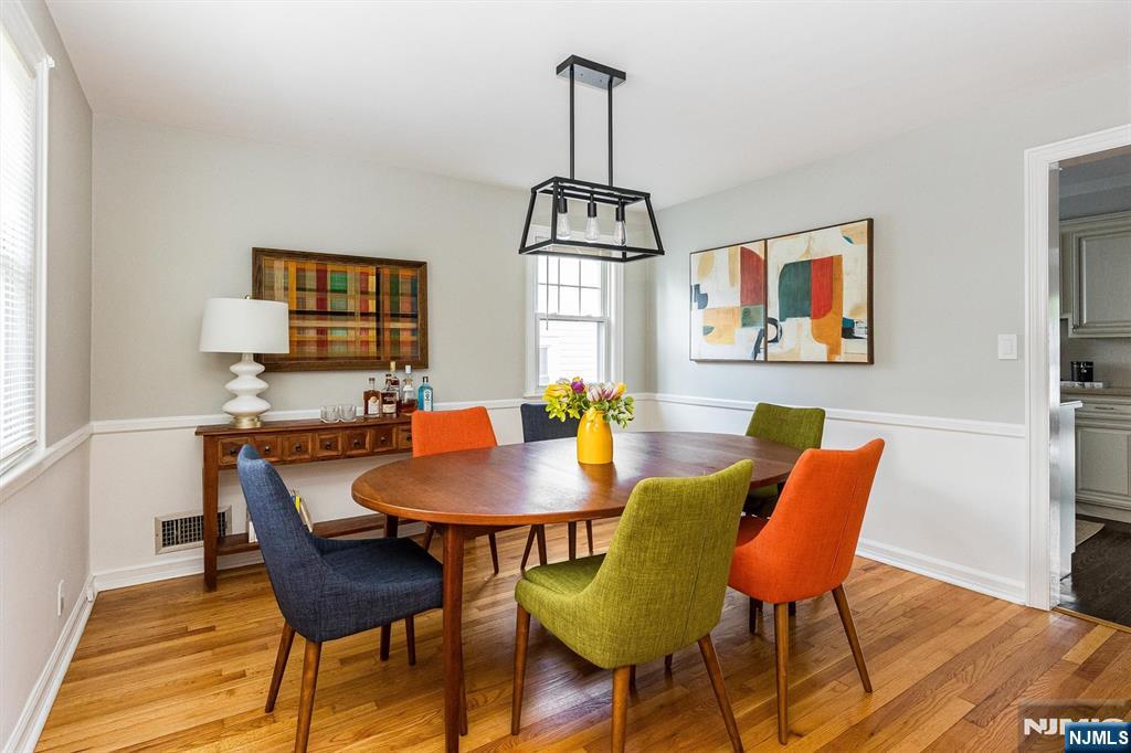 199 Stonehouse Road Bloomfield, NJ 07028 - Photo 21 of 36 a view of a dining room with furniture window and wooden floor