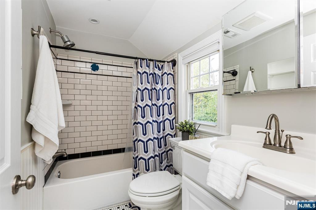 199 Stonehouse Road Bloomfield, NJ 07028 - Photo 26 of 36 a bathroom with a sink toilet and shower
