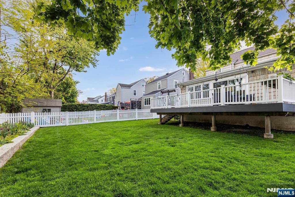 199 Stonehouse Road Bloomfield, NJ 07028 - Photo 35 of 36 a view of a house with a backyard and a deck