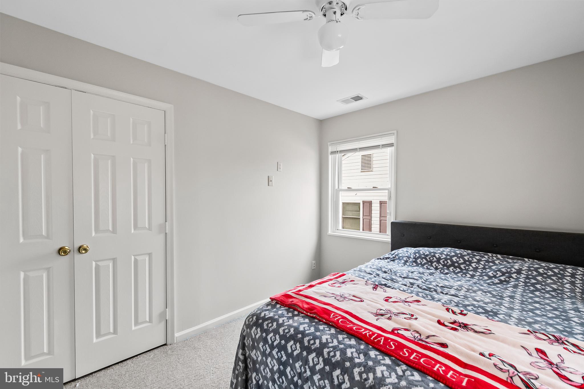 1204 Lindsay Road Oxon Hill, MD 20745 - Photo 20 of 28 a bedroom with a bed and a window