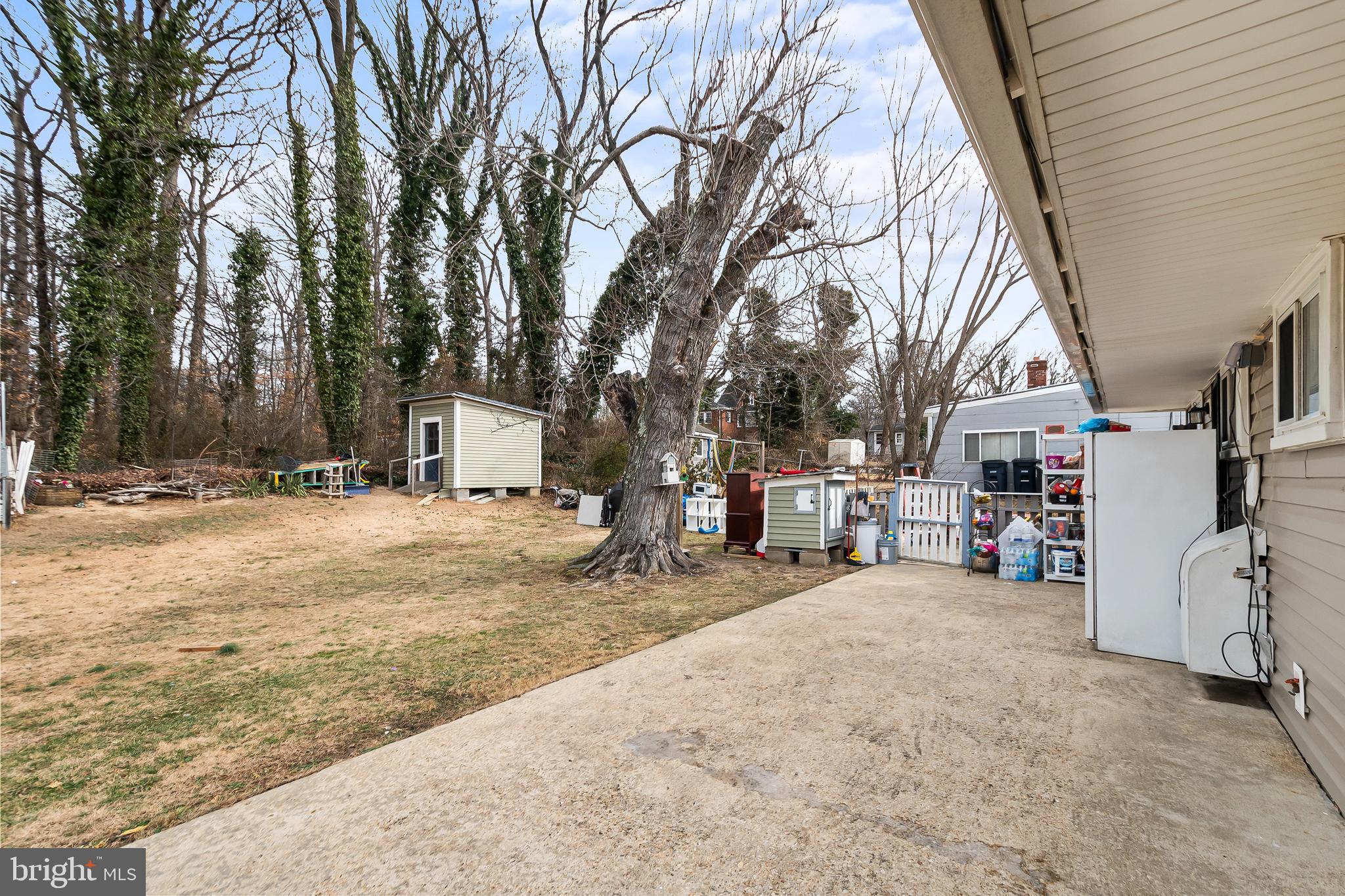 1204 Lindsay Road Oxon Hill, MD 20745 - Photo 23 of 28 a view of a house with a snow on the road