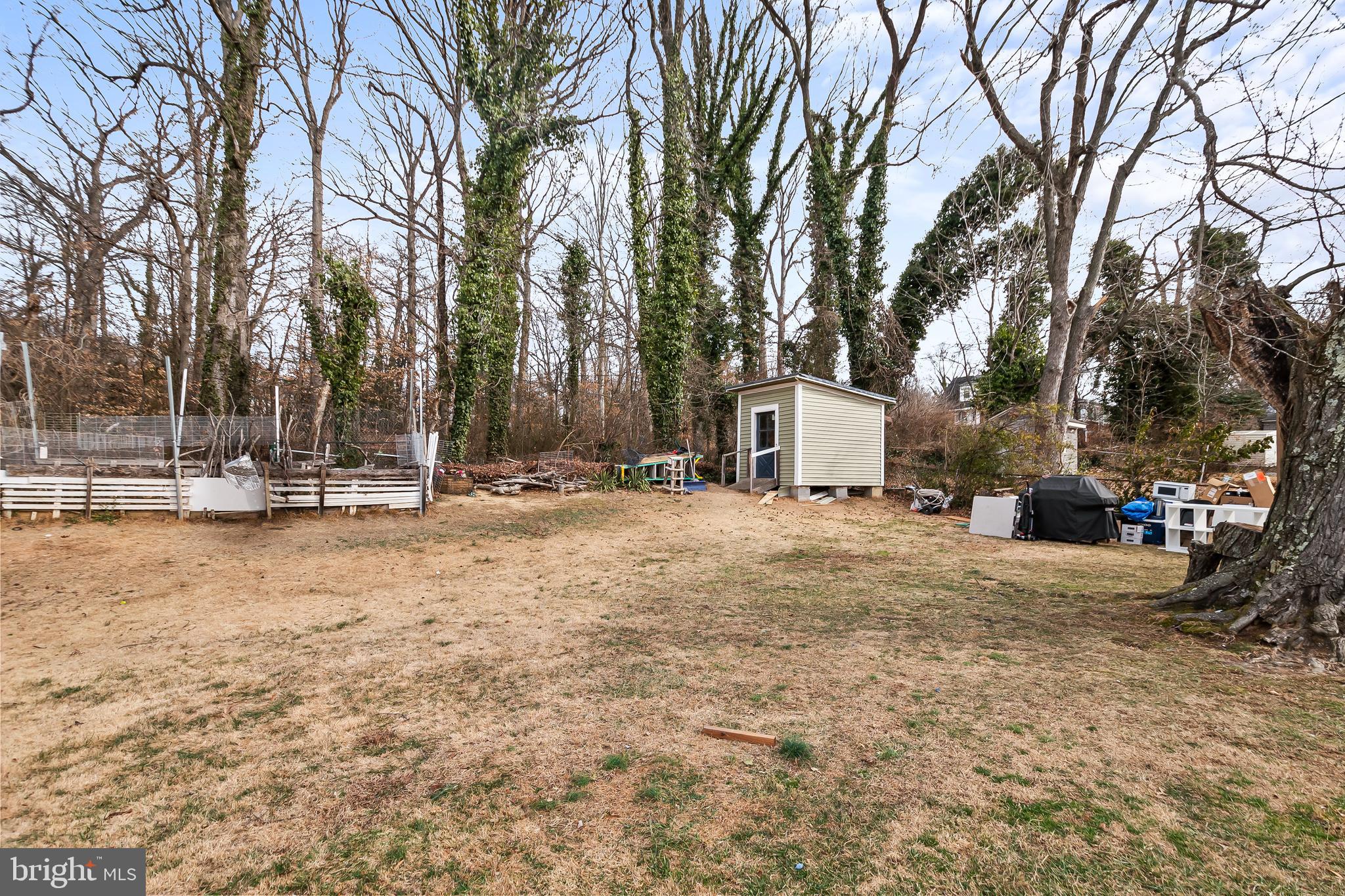 1204 Lindsay Road Oxon Hill, MD 20745 - Photo 25 of 28 a view of outdoor space with playground and tree