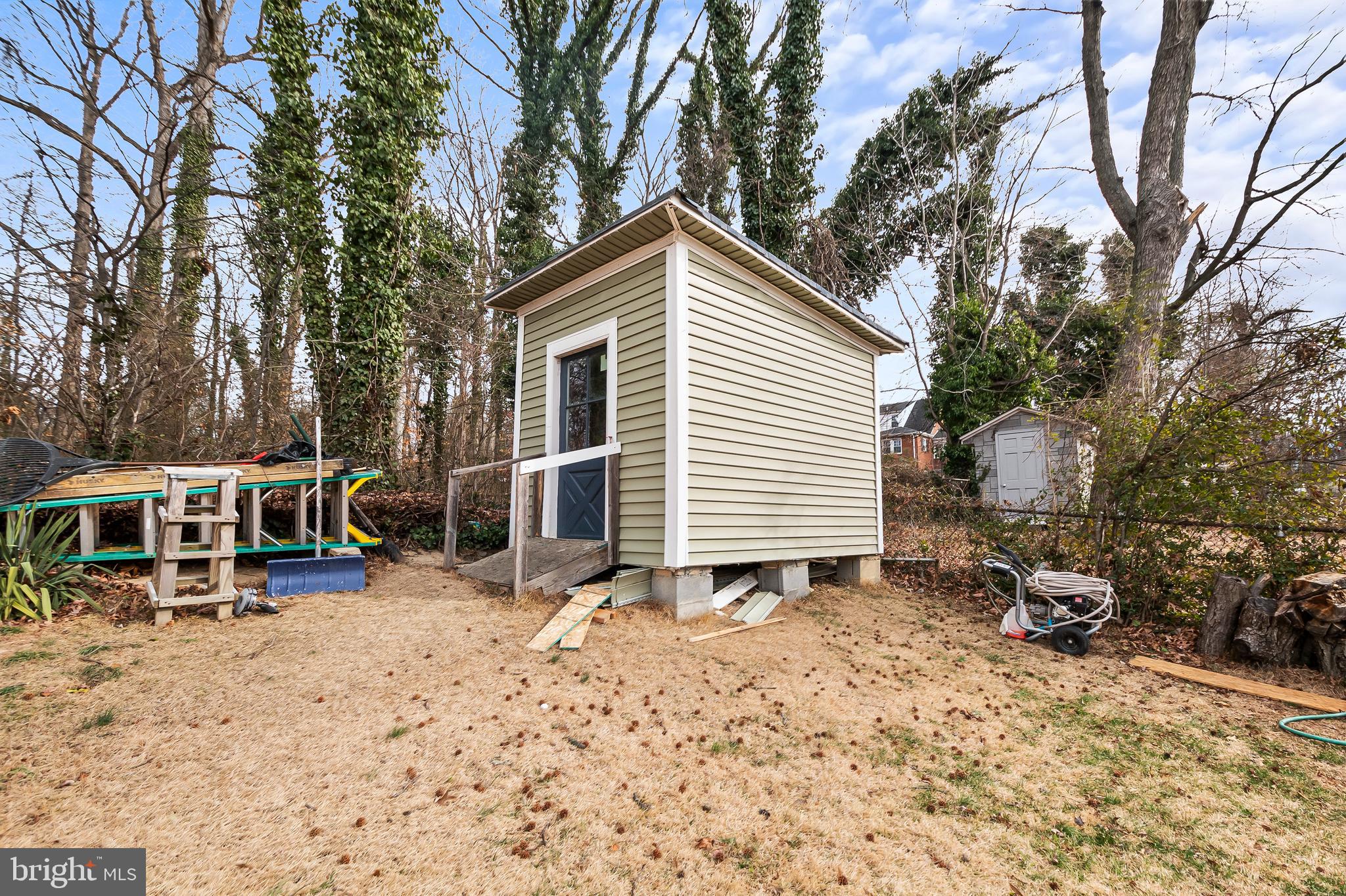 1204 Lindsay Road Oxon Hill, MD 20745 - Photo 26 of 28 a view of a house with a yard and sitting area