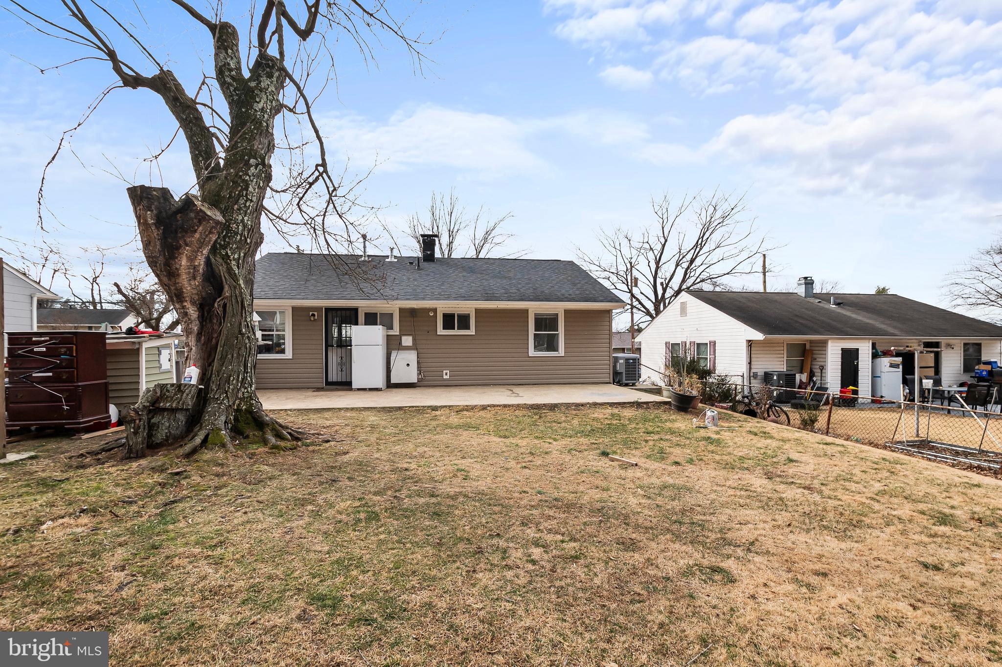 1204 Lindsay Road Oxon Hill, MD 20745 - Photo 28 of 28 a front view of a house with a yard