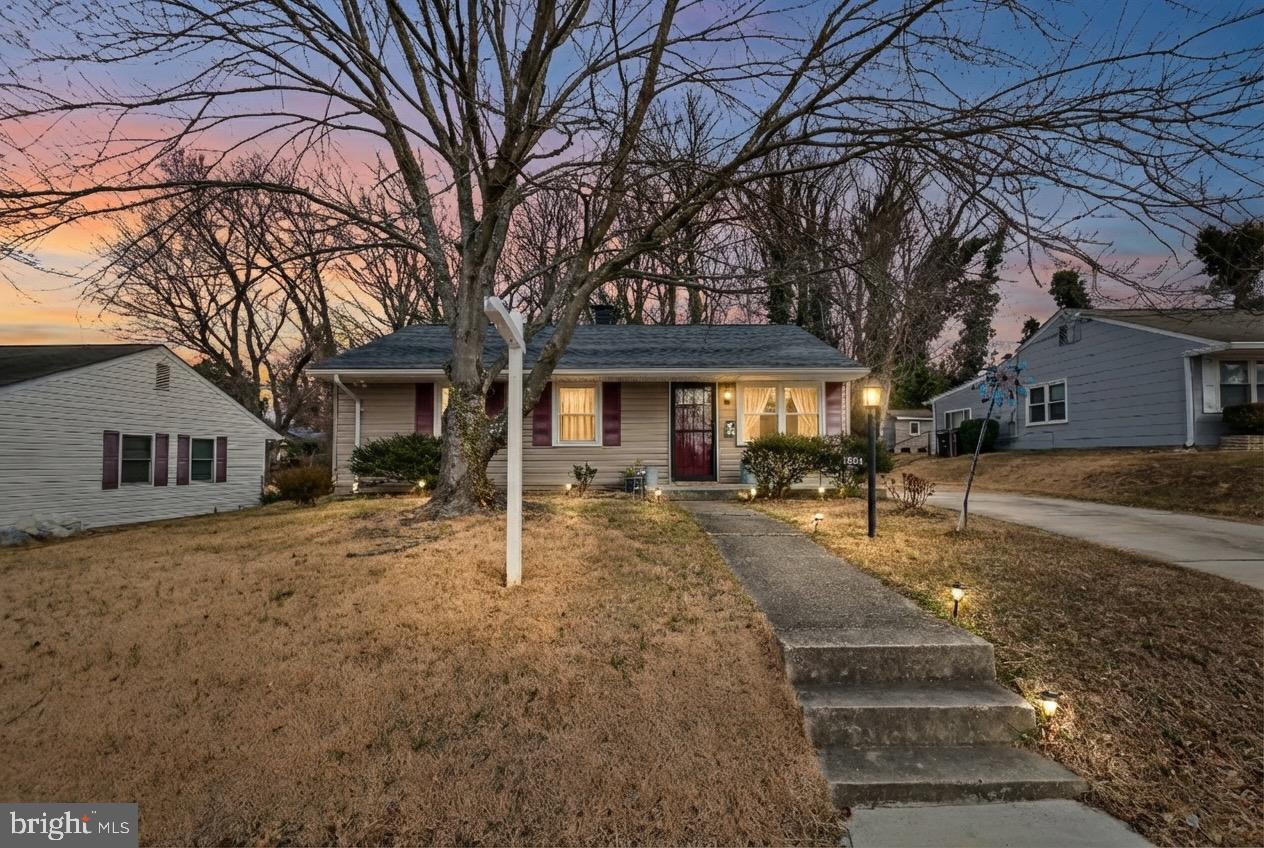 1204 Lindsay Road Oxon Hill, MD 20745 - Photo 4 of 28 a front view of a house with garden