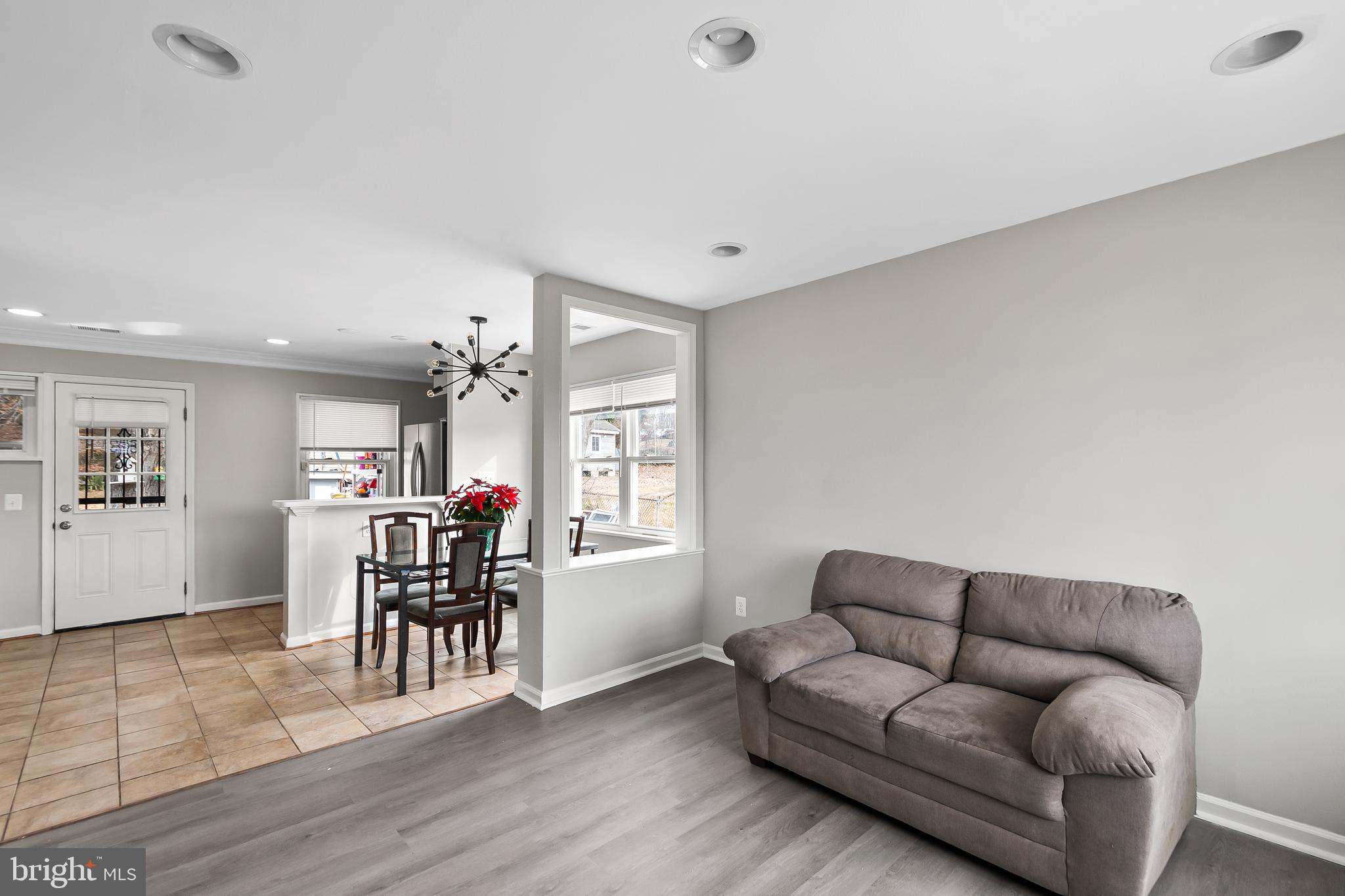 1204 Lindsay Road Oxon Hill, MD 20745 - Photo 7 of 28 a living room with furniture and wooden floor