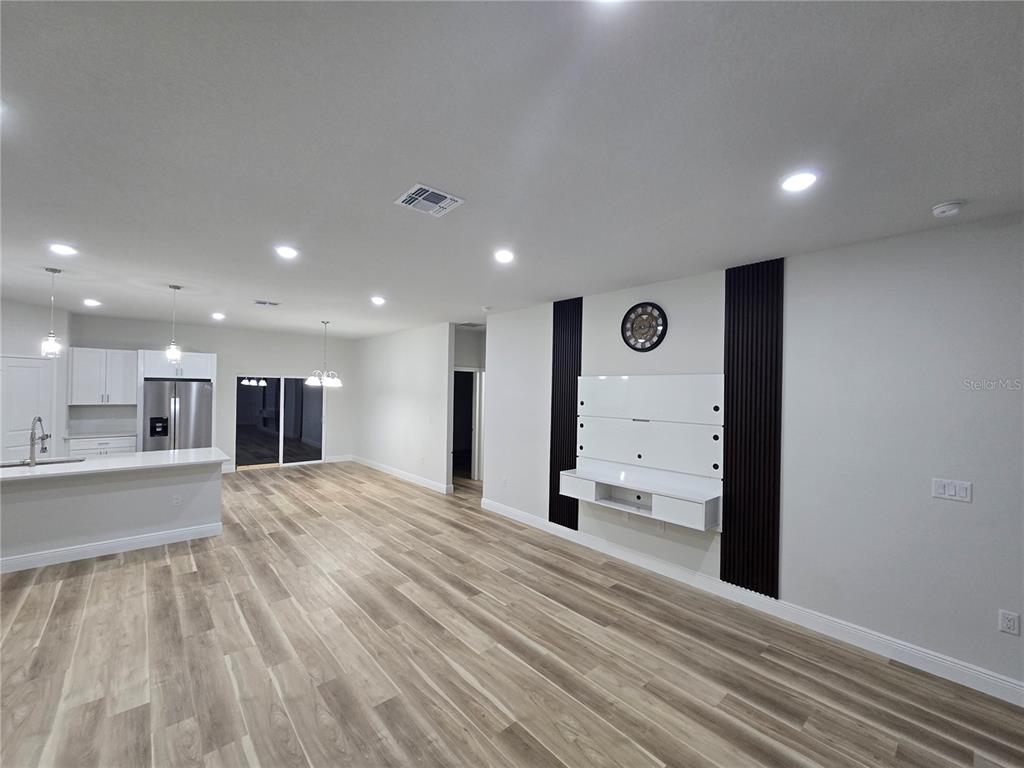 2717 Southwest 140th Loop Ocala, FL 34473 - Photo 3 of 40 a view of kitchen with windows
