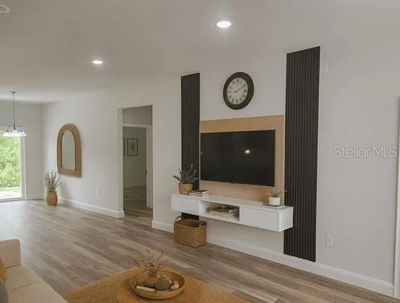 2717 Southwest 140th Loop Ocala, FL 34473 - Photo 4 of 40 a view of living room with furniture and window