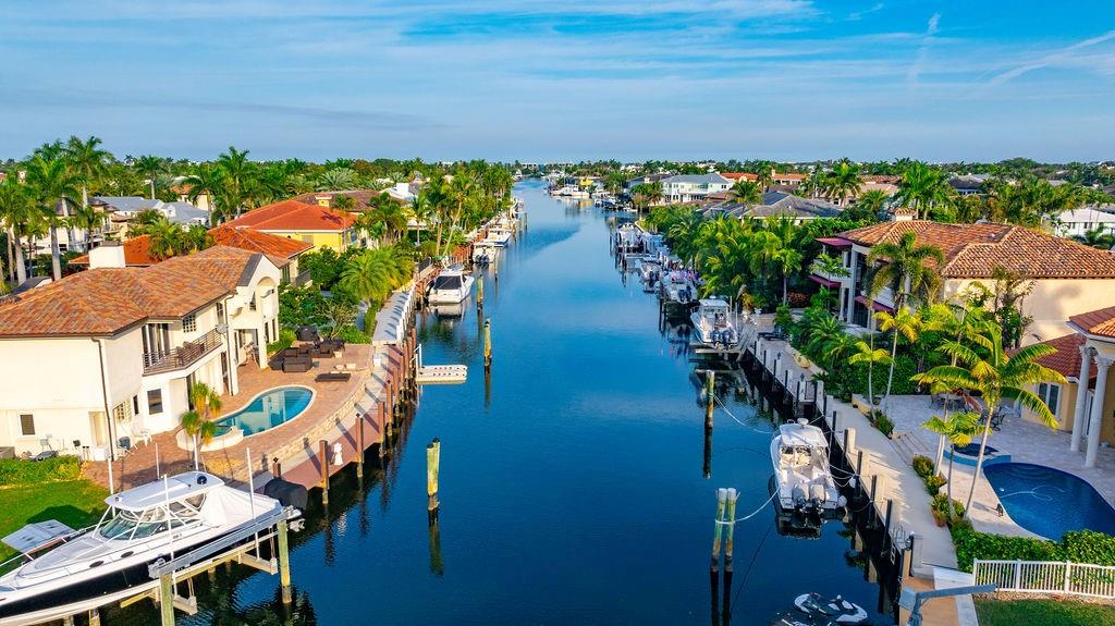 2317 Northeast 28th Court Lighthouse Point, FL 33064 - Photo 48 of 49 an aerial view of residential houses with outdoor space and trees