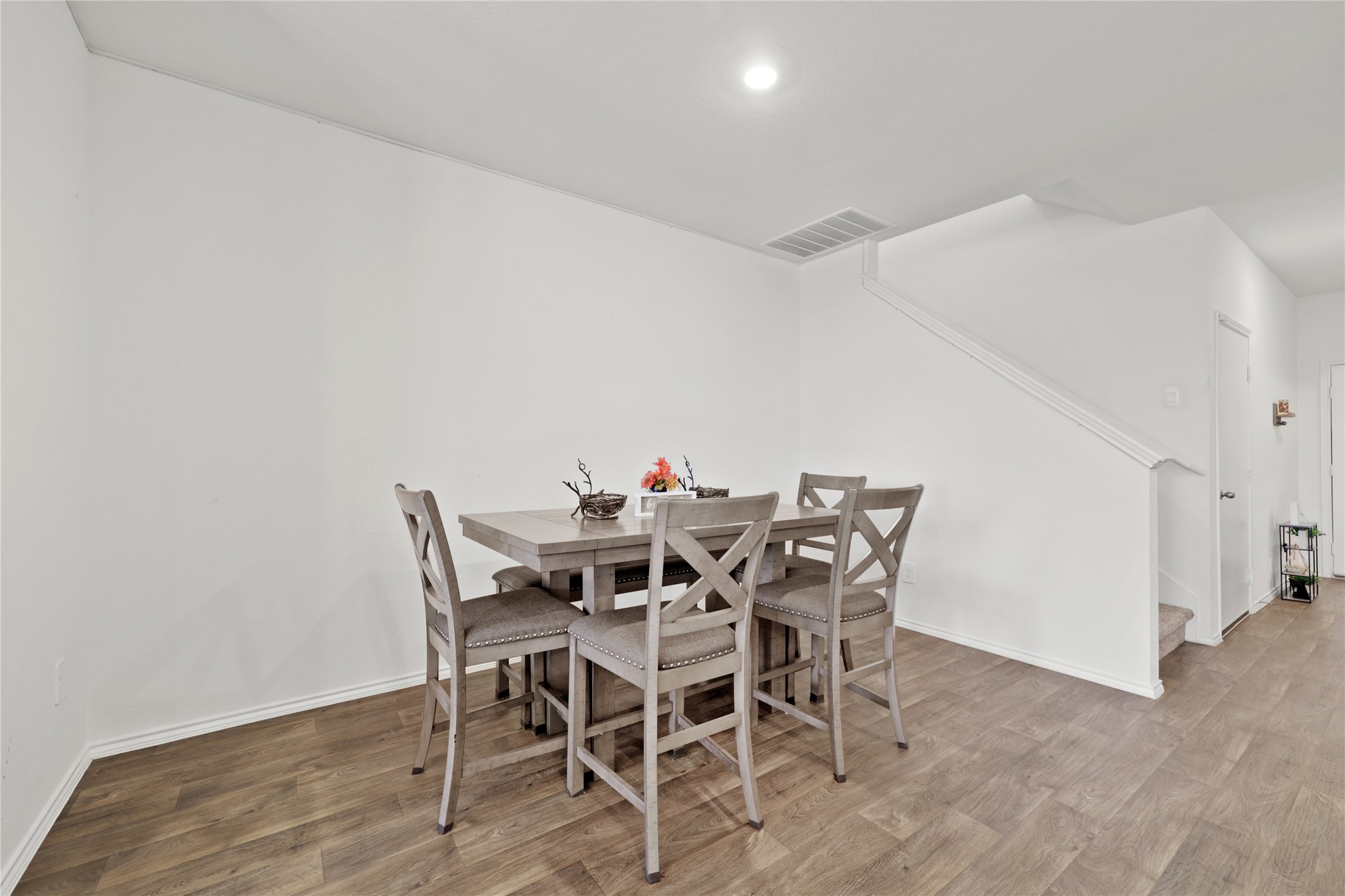 790 Arnold Loop Kyle, TX 78640 - Photo 14 of 36 This spacious dining area is perfectly positioned for entertaining, offering plenty of room for a large table where guests can gather right in the center of the action.