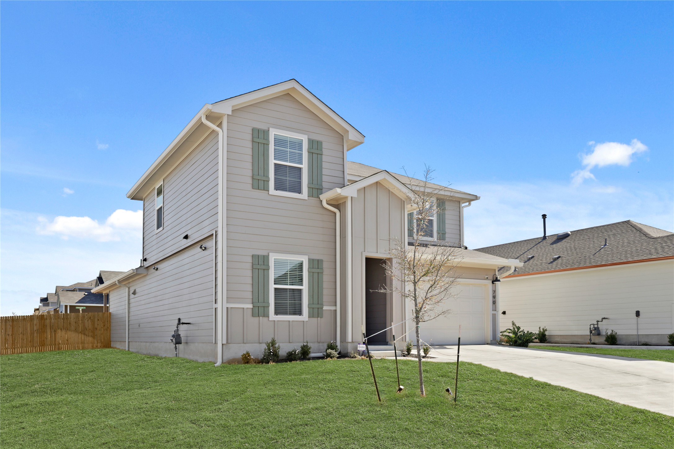 790 Arnold Loop Kyle, TX 78640 - Photo 3 of 36 Picture-perfect and move-in ready! This striking facade blends clean architectural lines with a lush, oversized front lawn, making it the undisputed standout of the neighborhood.