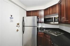 4625 Fifth Avenue, Unit 202 Pittsburgh, PA 15213 - Photo 12 of 28 a kitchen with a refrigerator stove and microwave