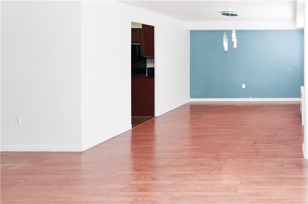 4625 Fifth Avenue, Unit 202 Pittsburgh, PA 15213 - Photo 13 of 28 a view of a livingroom with wooden floor