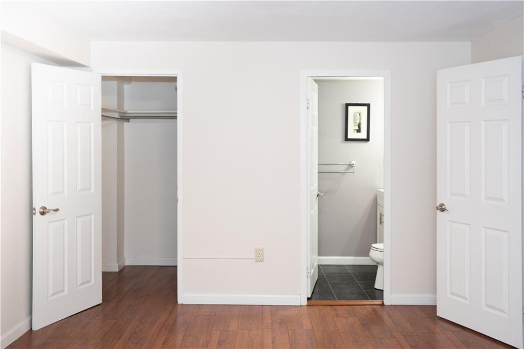4625 Fifth Avenue, Unit 202 Pittsburgh, PA 15213 - Photo 16 of 28 a view of an empty room with wooden floor