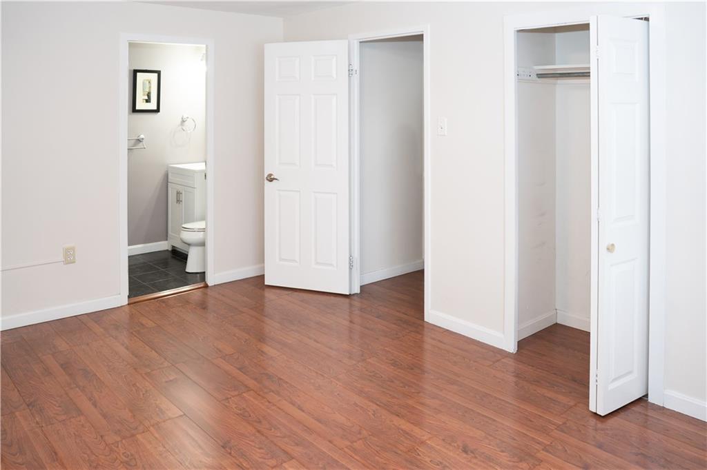 4625 Fifth Avenue, Unit 202 Pittsburgh, PA 15213 - Photo 17 of 28 a view of an empty room with wooden floor