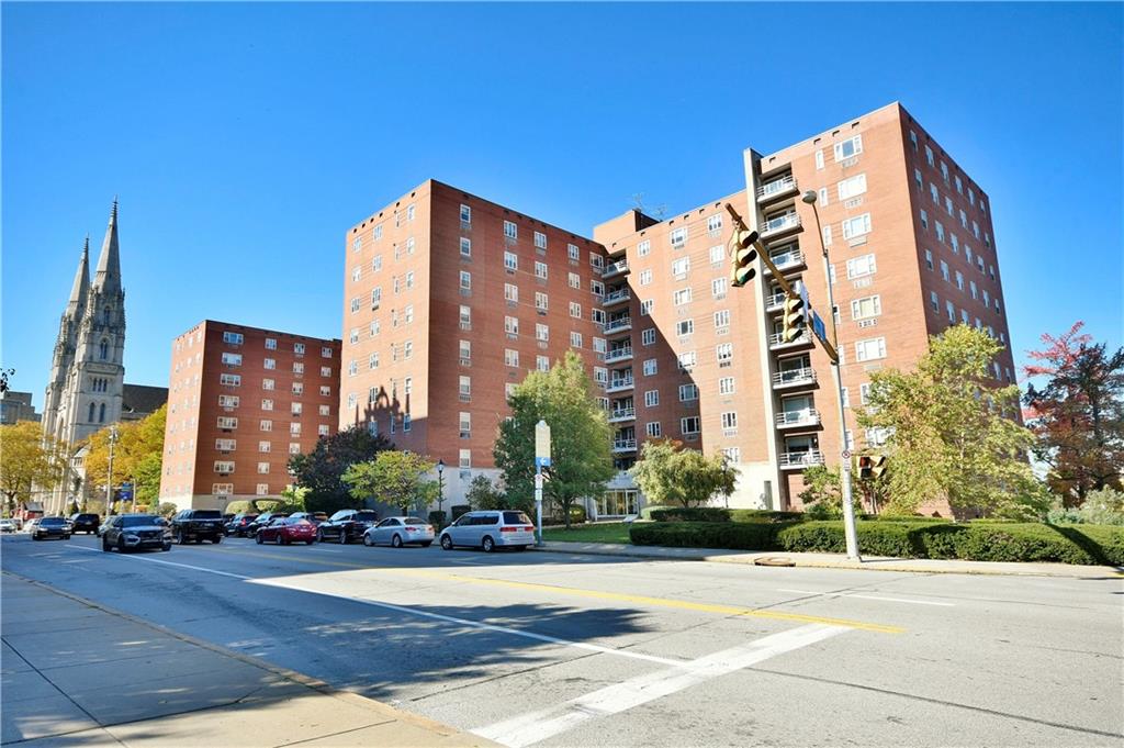 4625 Fifth Avenue, Unit 202 Pittsburgh, PA 15213 - Photo 2 of 28 a view of a tall building next to a road