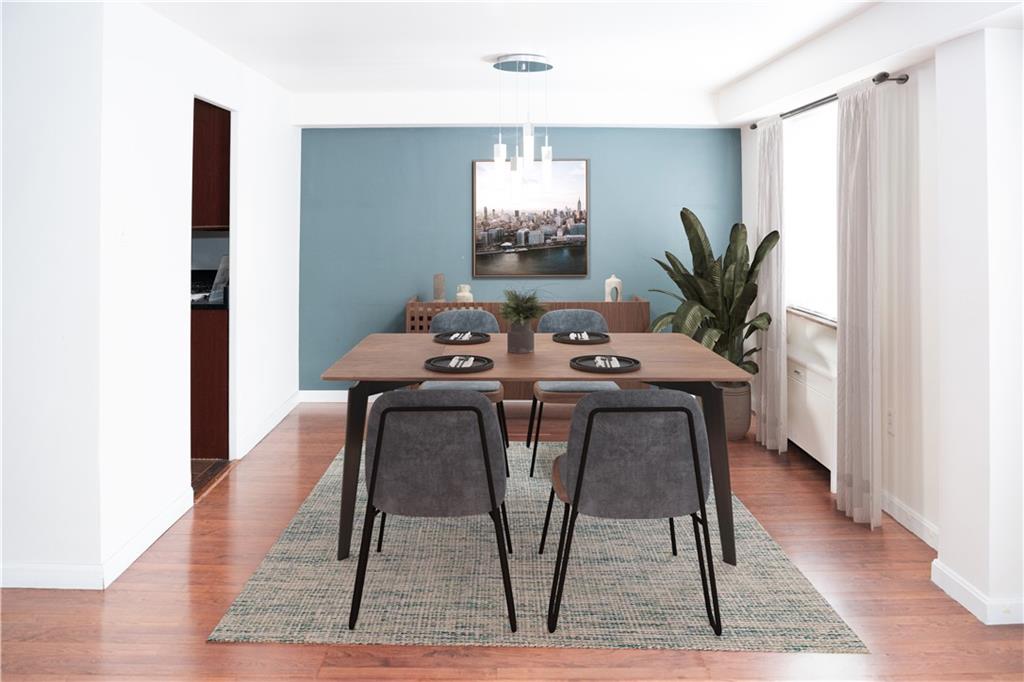 4625 Fifth Avenue, Unit 202 Pittsburgh, PA 15213 - Photo 6 of 28 a view of a dining room with furniture and a rug