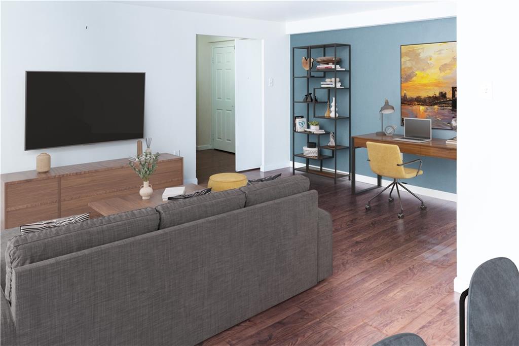 4625 Fifth Avenue, Unit 202 Pittsburgh, PA 15213 - Photo 8 of 28 a living room with furniture and a flat screen tv