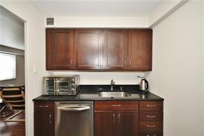 4625 Fifth Avenue, Unit 202 Pittsburgh, PA 15213 - Photo 10 of 28 a kitchen with a sink and cabinets