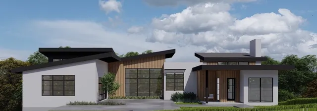 a front view of house with yard outdoor seating and barbeque oven