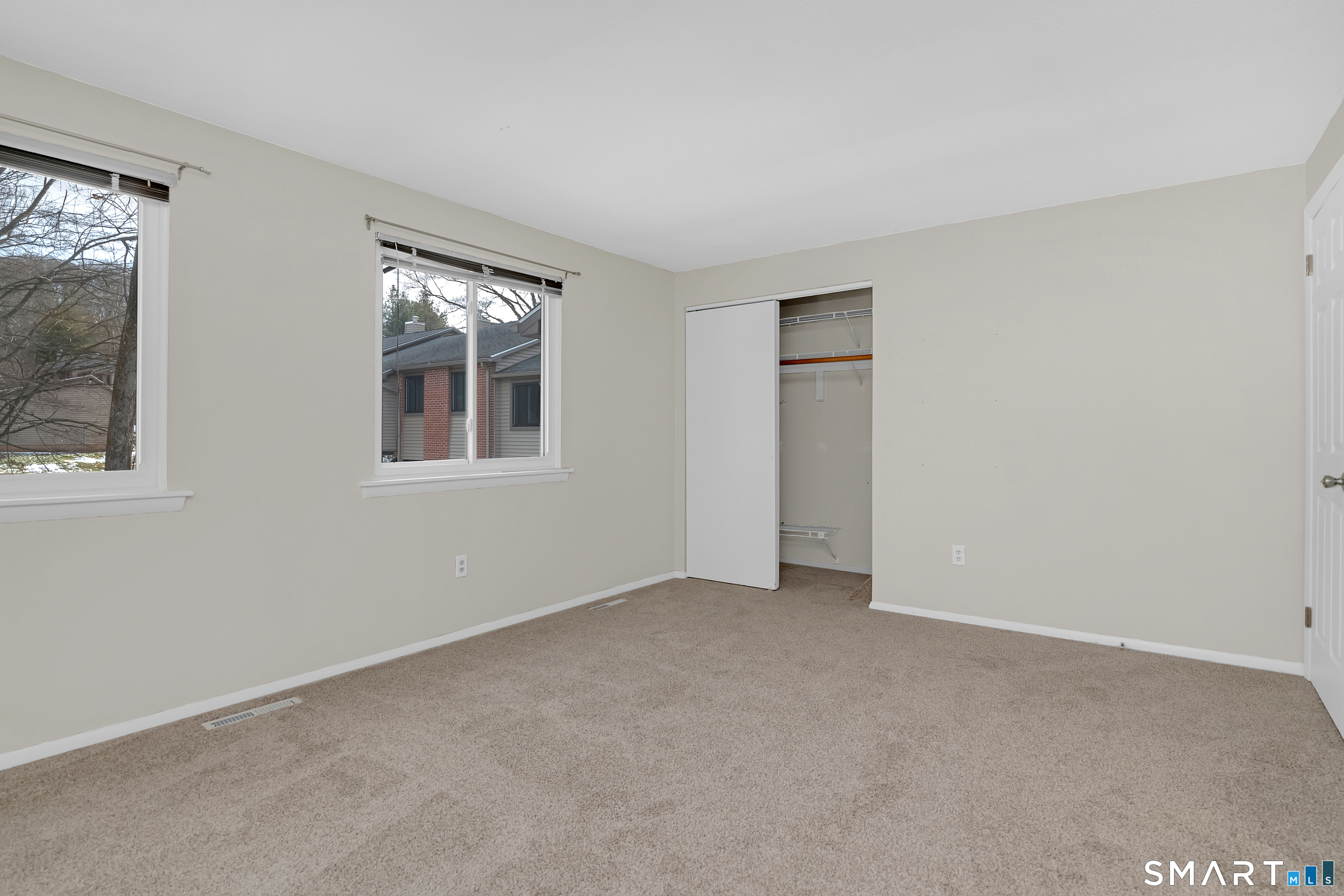 32 Conestoga Way, Unit 32 Glastonbury, CT 06033 - Photo 36 of 38 a view of an empty room with a window