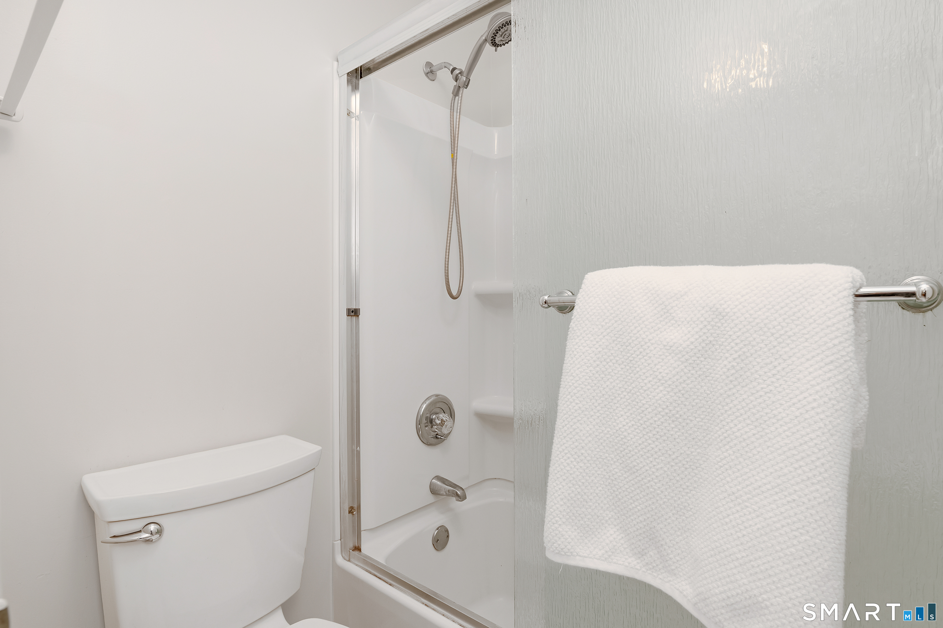 32 Conestoga Way, Unit 32 Glastonbury, CT 06033 - Photo 38 of 38 a bathroom with a shower and a toilet