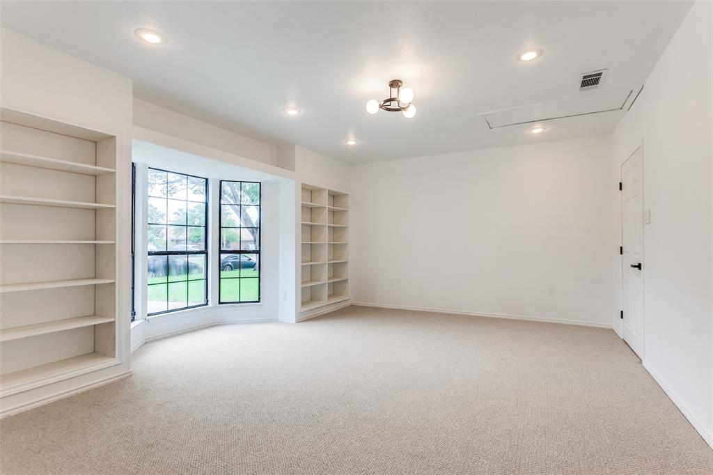 2718 Runningbrook Lane Dallas, TX 75228 - Photo 6 of 23 a view of an empty room with a window and balcony